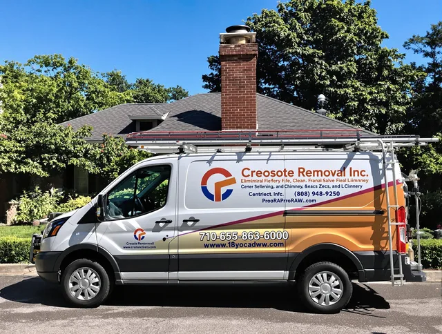 Grove City Chimney Sweep technician removing creosote safely in Grove City, OH
