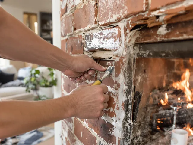 Routine fireplace repair by Grove City Chimney Sweep in Grove City, OH